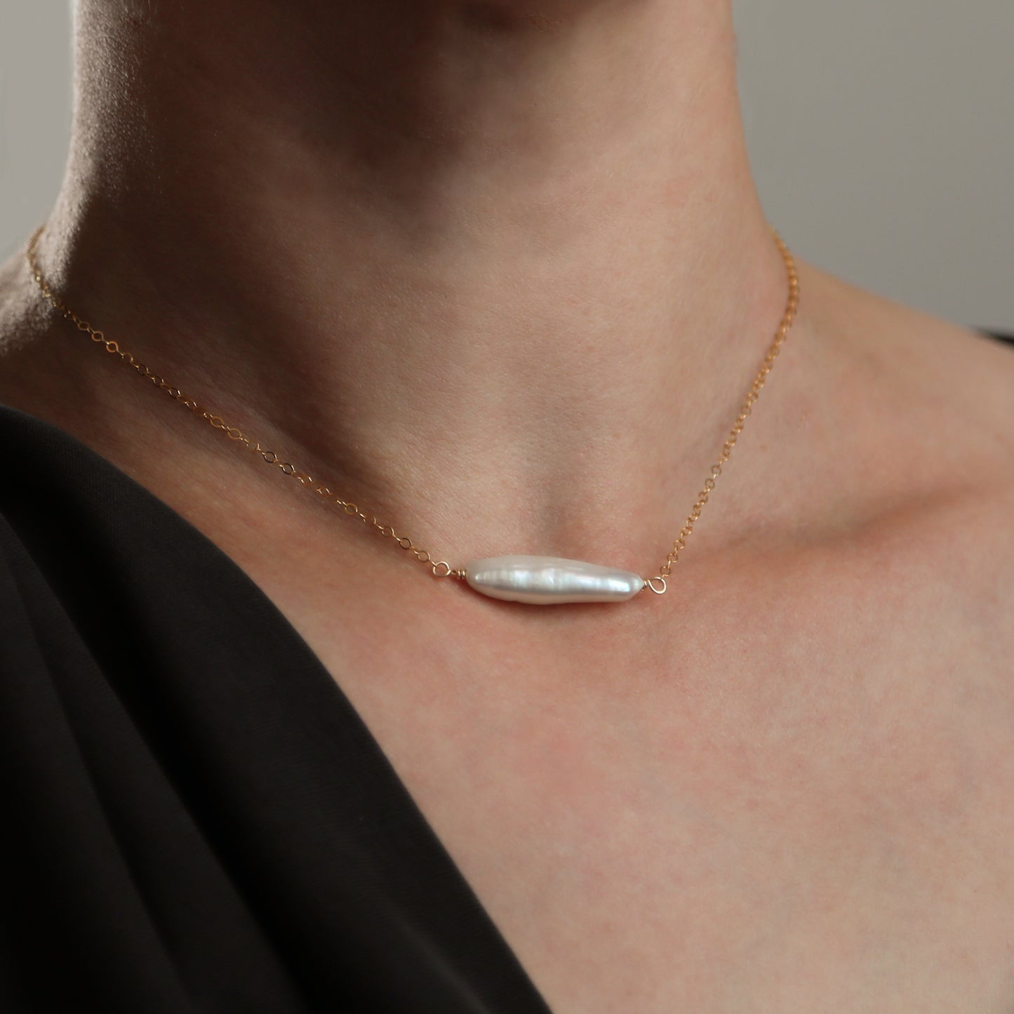 Gold necklace with one Pearl