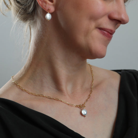 Gold paperclip chain necklace with toggle clasp and pearl drop