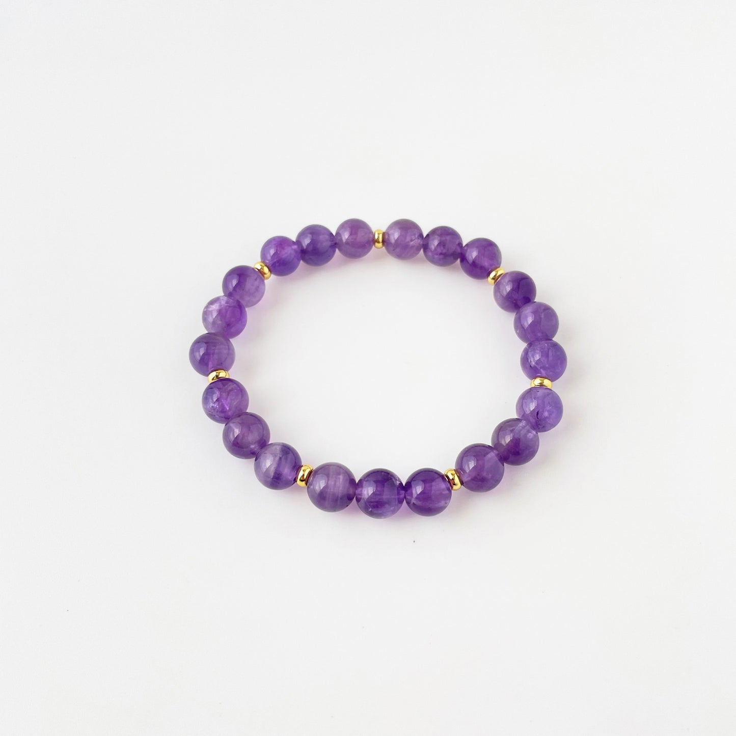 Amethyst bead bracelet with gold accents