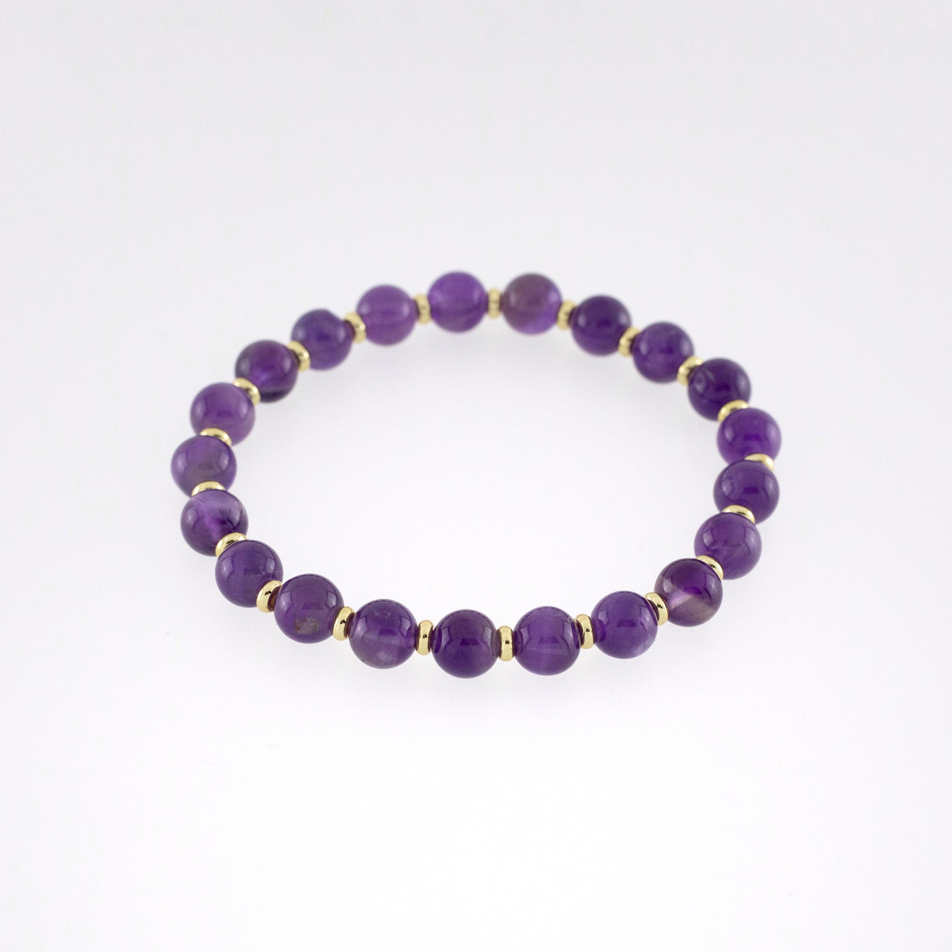 Amethyst stretch bracelet with gold spacer beads