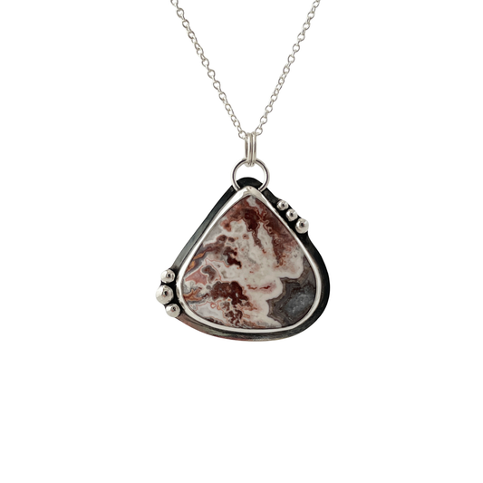 sterling silver pendant with a Crazy Lace Agate