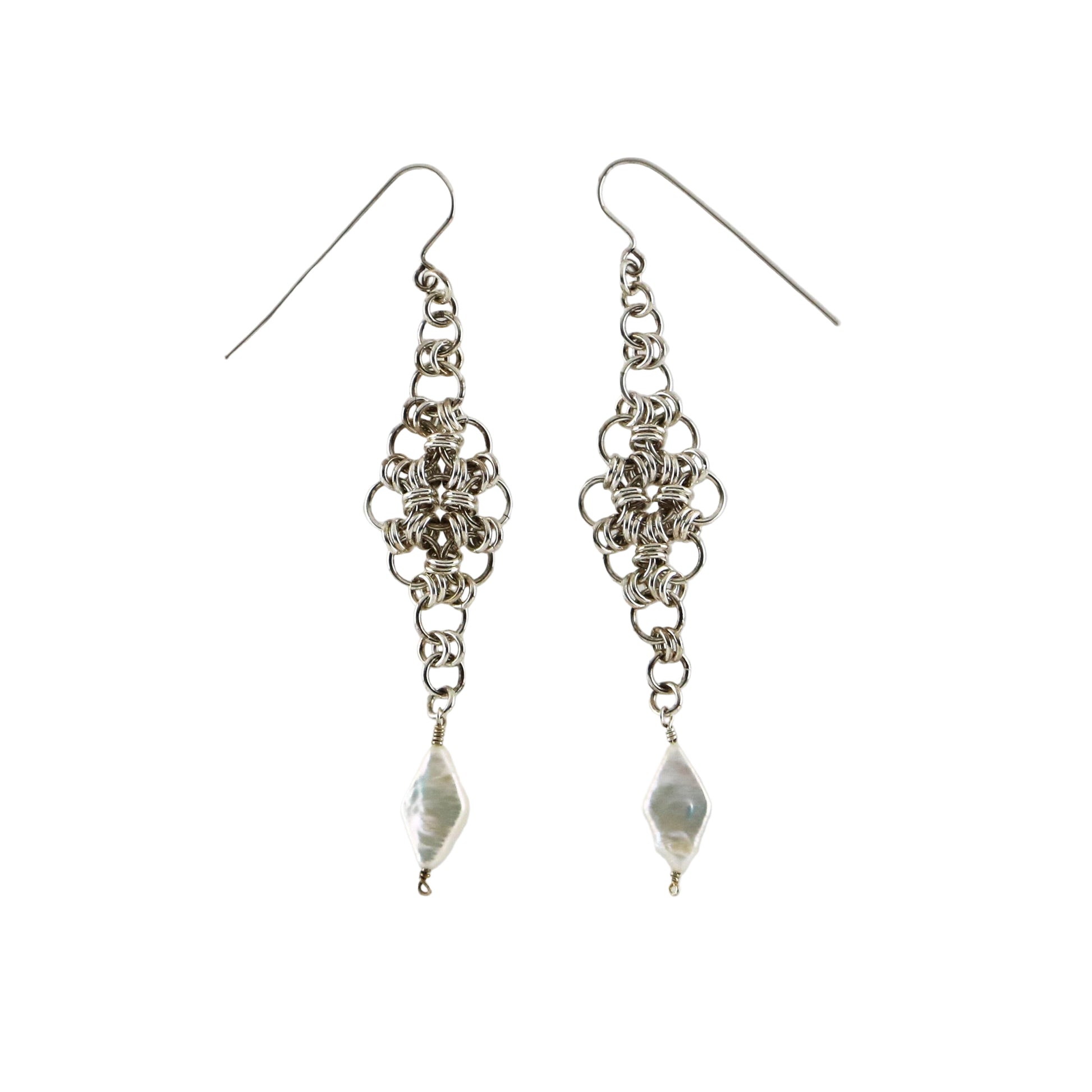 A pair of sterling silver chainmail earrings with freshwater pearl accents.