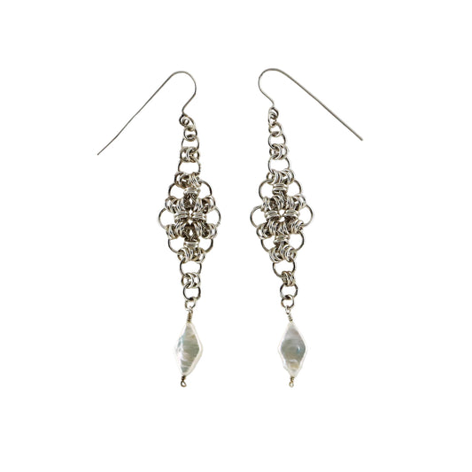 A pair of sterling silver chainmail earrings with freshwater pearl accents.