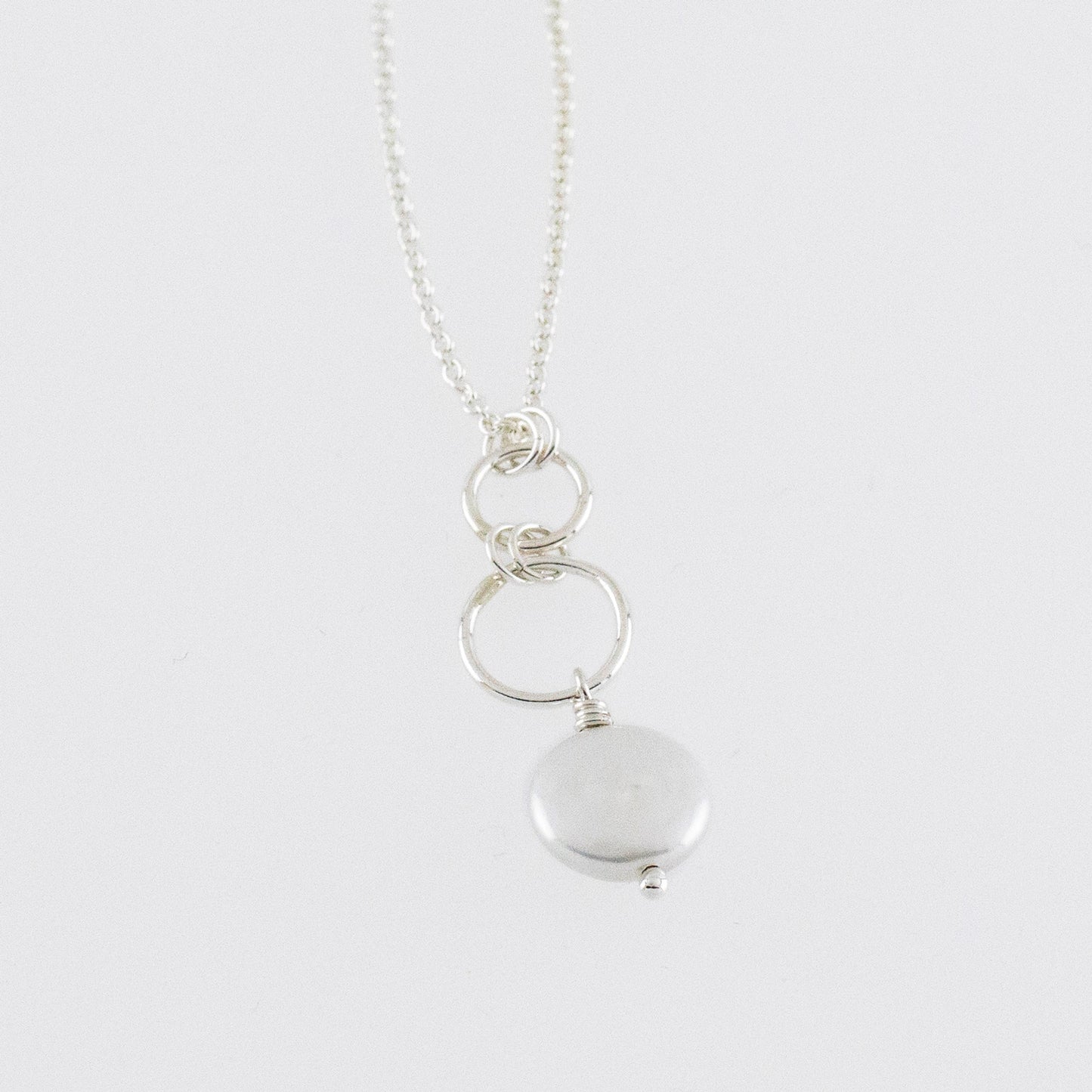 silver circles pendant with pearl